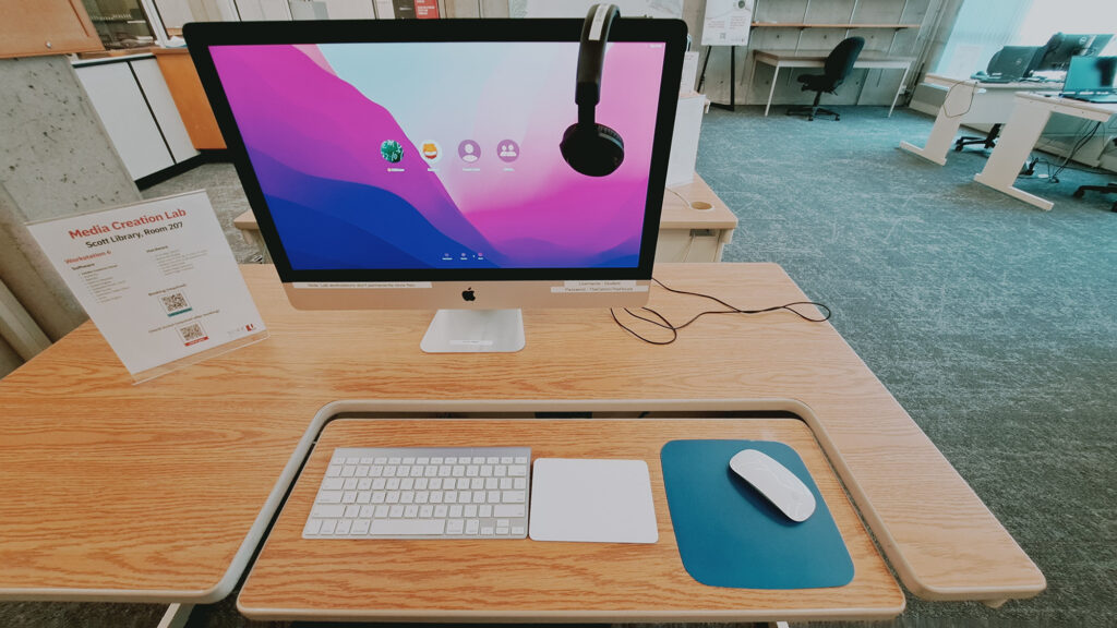 iMac with keyboard, trackpad, and mouse