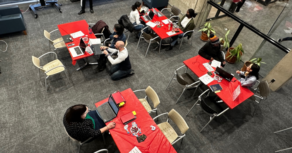 students at Scott Library during Wiki-edit-a-thon at desks